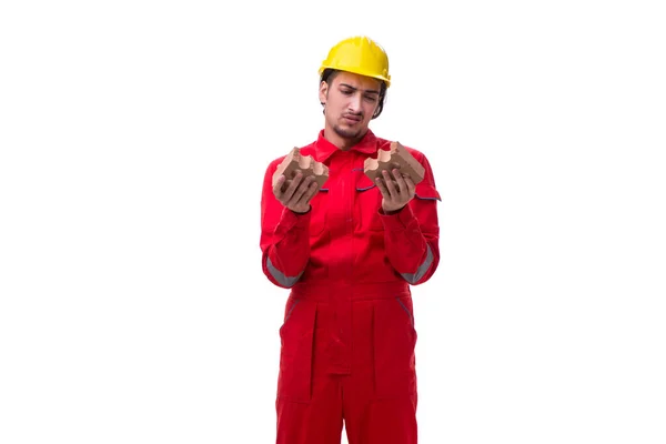 Young male mason with brick isolated on white — Stock Photo, Image