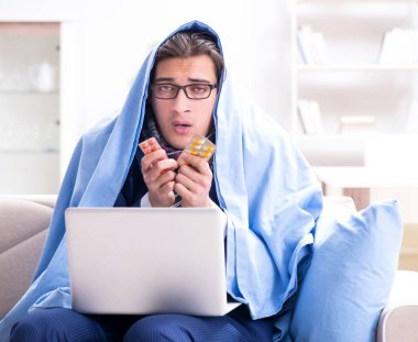 Hasta işadamı grip nedeniyle evden çalışıyor.