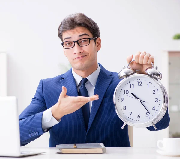 Businessman employee in urgency and deadline concept with alarm — Stock Photo, Image