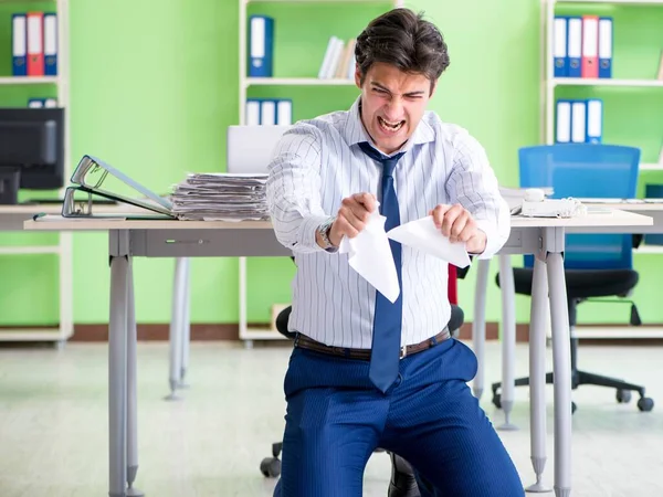 Frustrated businessman stressed from excessive work — Stock Photo, Image