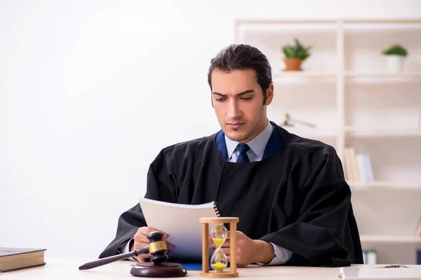 Young male judge in time management concept — Stock Photo, Image