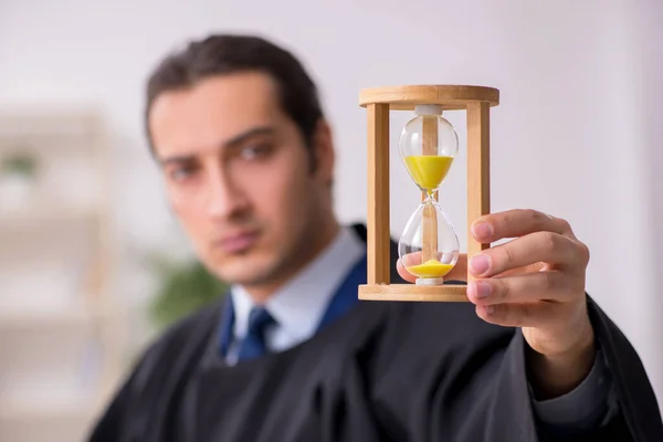 Young male judge in time management concept — Stock Photo, Image