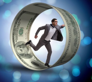 Hamster çarklı bir iş adamı dolarları kovalıyor.