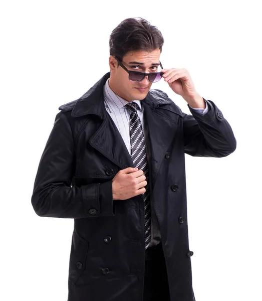 O jovem homem de negócios usando casaco de inverno isolado em branco — Fotografia de Stock