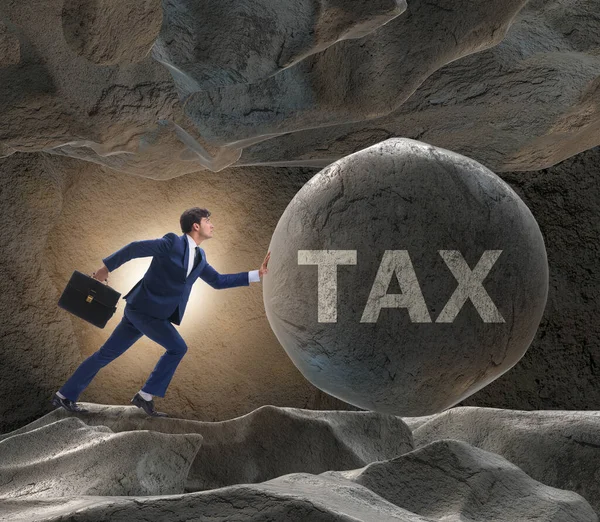 Empresário em altos impostos conceito de negócio — Fotografia de Stock