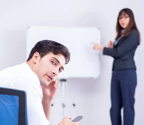 Business presentation in the office with man and woman — Stock Photo, Image