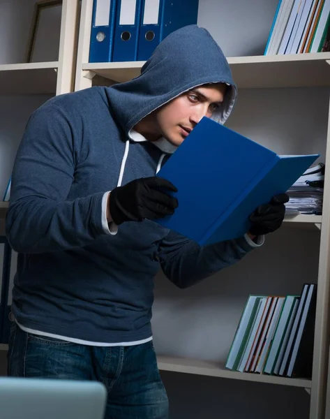 The young man in industrial espionage concept — Stock Photo, Image