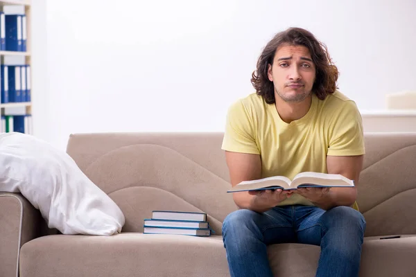 Young male student preparing for exams at home — Stock Photo, Image