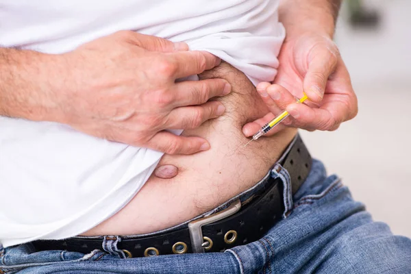 Paciente que sufre de diabetes médico visitante — Foto de Stock