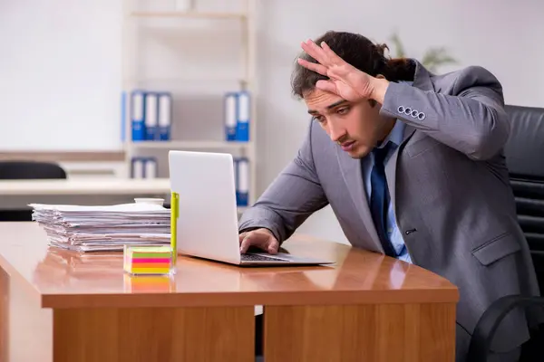 Young male employee sleeping in the office — Stock Photo, Image