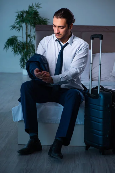 Young male employee in business trip concept — Stock Photo, Image