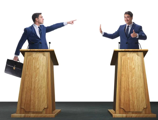 Zwei Geschäftsleute liefern sich hitzige Diskussion bei Podiumsdiskussion — Stockfoto
