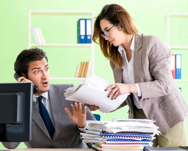 Man employee suffering from excessive work — Stock Photo, Image