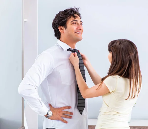 Woman sees her husband off to work — Stock Photo, Image