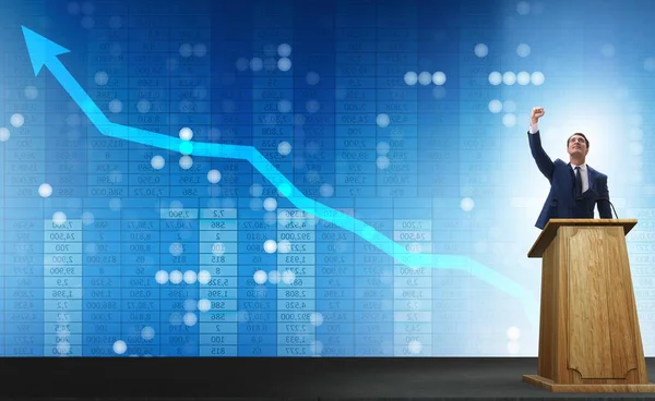 Muž podnikatel dělat řeč na rostrum v podnikatelském konceptu — Stock fotografie