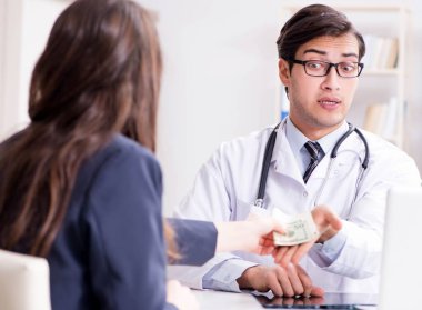 Rüşvet teklif edilen yolsuzluk konsepti doktoru.