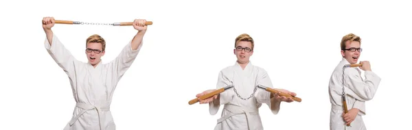 Combattente karate divertente con nunchaku su bianco — Foto Stock