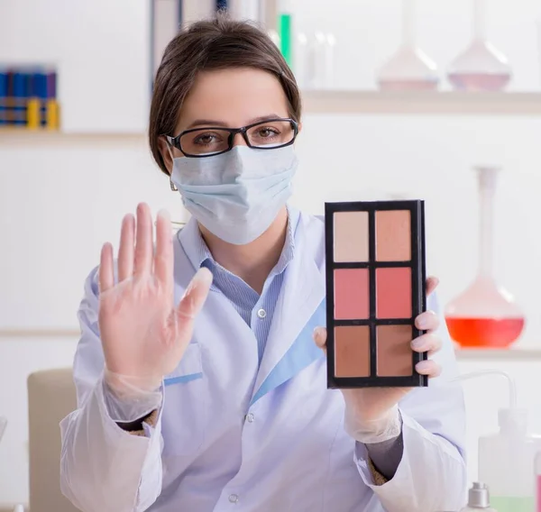 Lab chemist checking beauty and make-up products