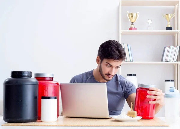 Athlete tasting new protein supplements for better muscles