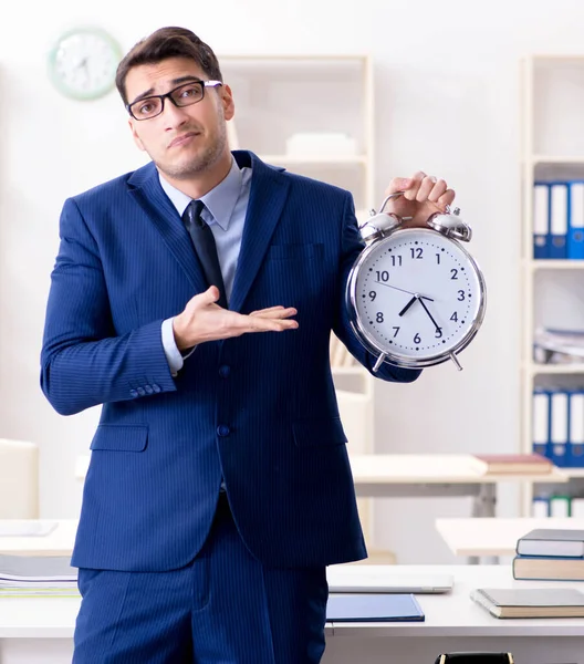 Businessman struggling to meet deadline