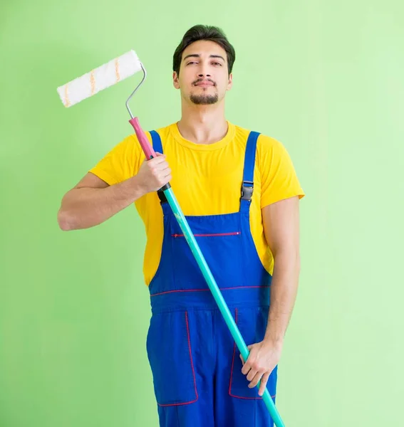 Young painter doing renovation at home — Stock Photo, Image