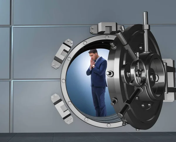 Businessman concerned about theft at banking vault door — Stock Photo, Image