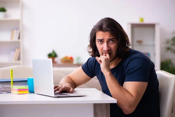 Young man employee working from house — Stock Photo, Image