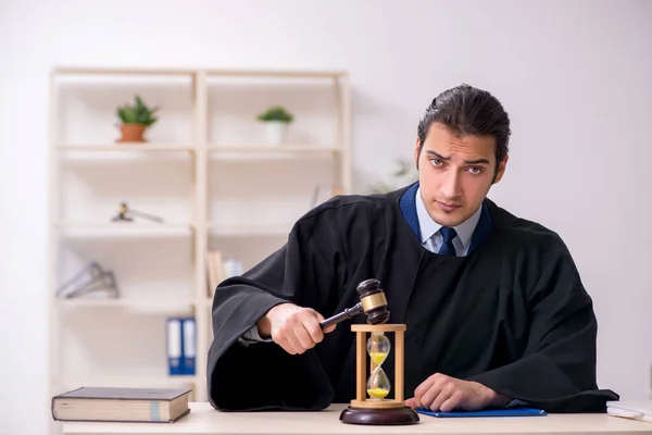 Young male judge in time management concept — Stock Photo, Image