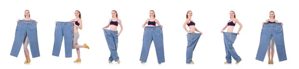 Woman with large jeans in dieting concept — Stock Photo, Image