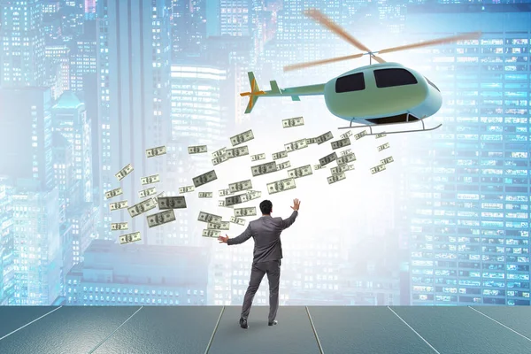 İş adamıyla helikopter para konsepti — Stok fotoğraf