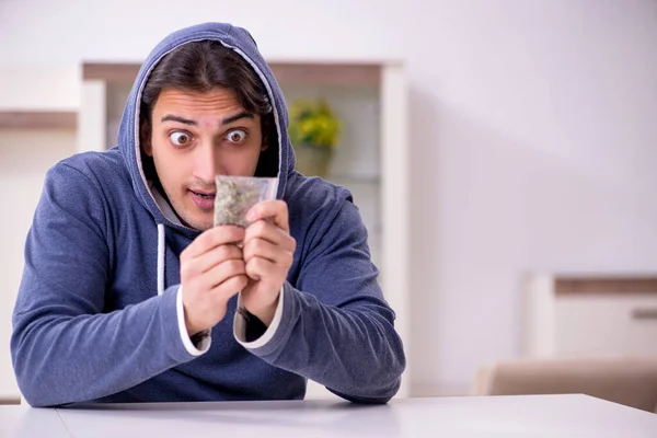 Young man having problems with narcotics at home — Stock Photo, Image