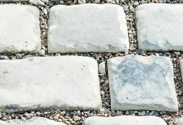 Straße gepflastert mit Pflastersteinen für den Hintergrund — Stockfoto