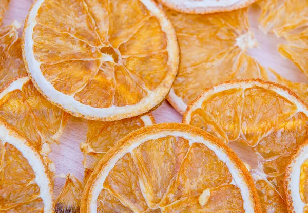 Padrão organizado com fatias de laranja secas — Fotografia de Stock