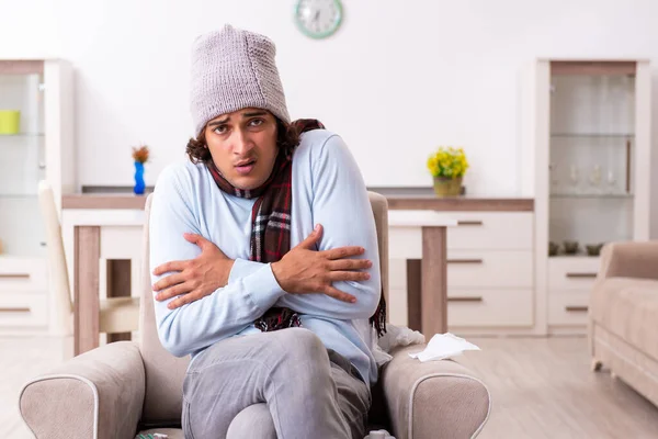 Young man suffering from flu at home — Stock Photo, Image