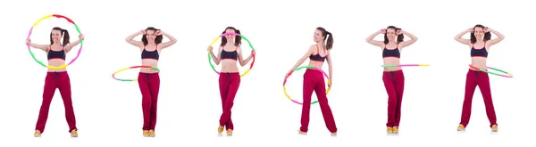 Mulher fazendo exercícios com hula hoop — Fotografia de Stock