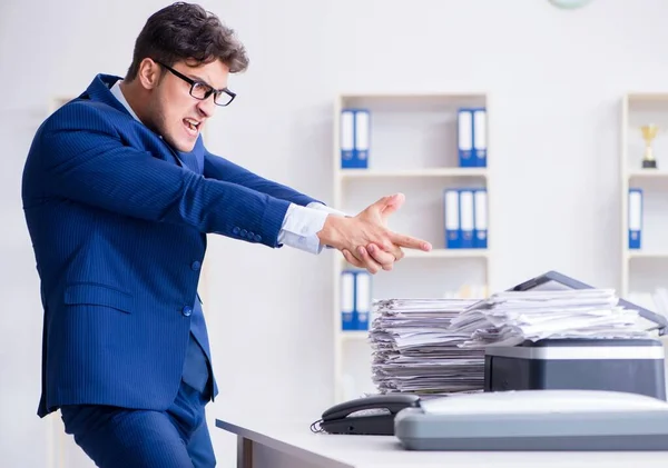 The businessman making copies in copying machine — Stock Photo, Image