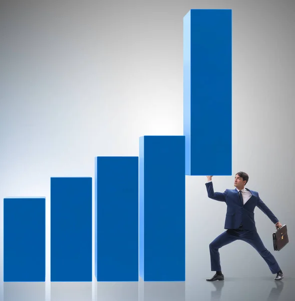 O empresário que apoia o crescimento na economia no gráfico gráfico — Fotografia de Stock
