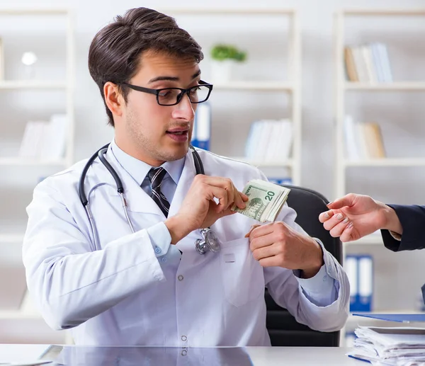 Doctor in corruption concept with being offered bribe — Stock Photo, Image