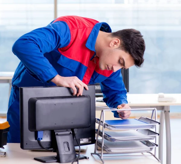 Computer repairman specialist repairing computer desktop