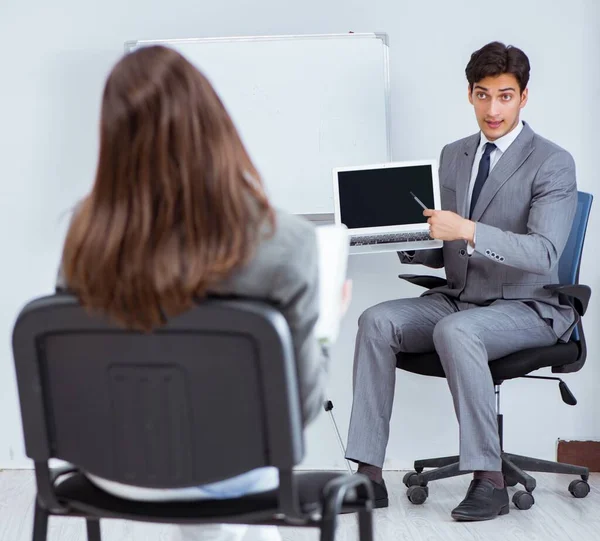 Business presentation in the office with man and woman — Stock Photo, Image