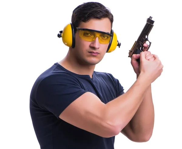 Homem fazendo tiro esportivo de arma isolada em branco — Fotografia de Stock