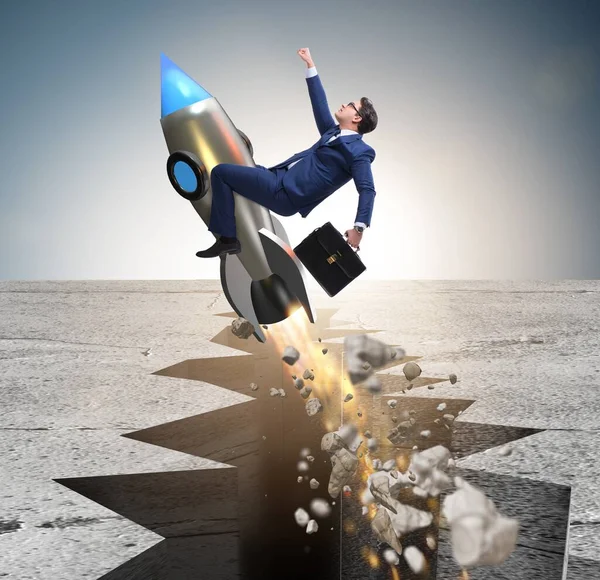 Businessman flying on rocket from rock gap — Stock Photo, Image