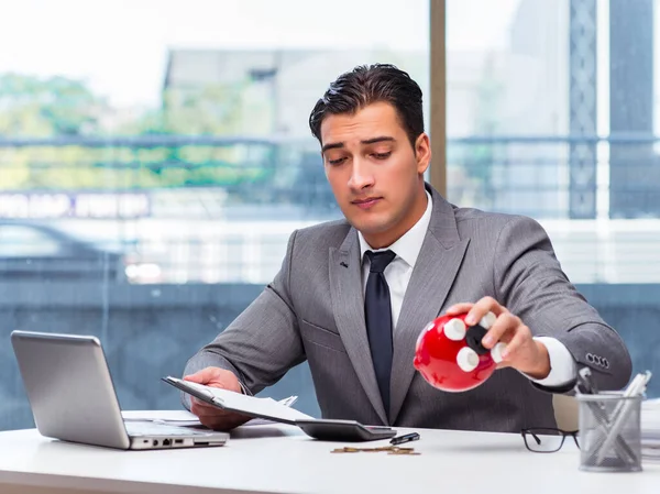 Bankrupt broke businessman with piggy bank — Stock Photo, Image