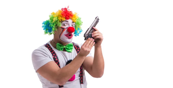 Payaso divertido con una pistola aislada sobre fondo blanco —  Fotos de Stock