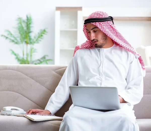 Arab man working at home on his work — Stock Photo, Image