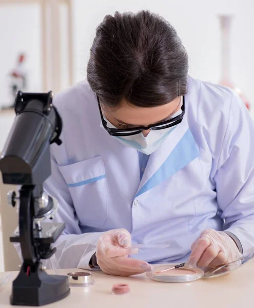 Lab chemist checking beauty and make-up products