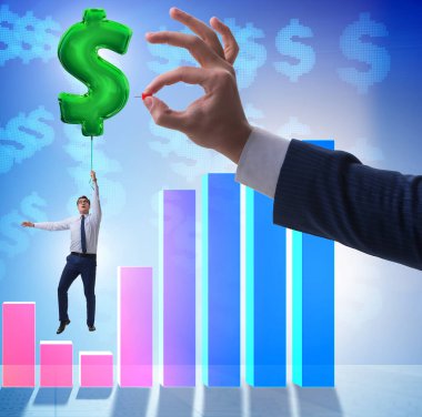 Dolar işareti üzerinde uçan bir iş adamı. Finansal olarak şişirilebilir balon.