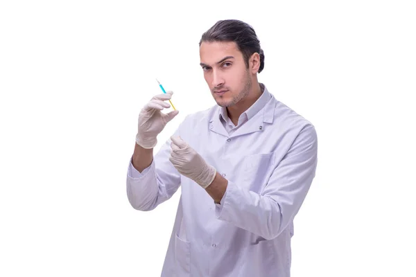 Jovem médico bonito com seringa isolada em branco — Fotografia de Stock