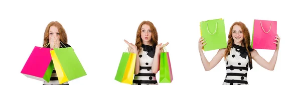 Jeune femme avec des sacs à provisions sur blanc — Photo