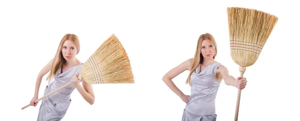 Young woman with broom on white — Stock Photo, Image